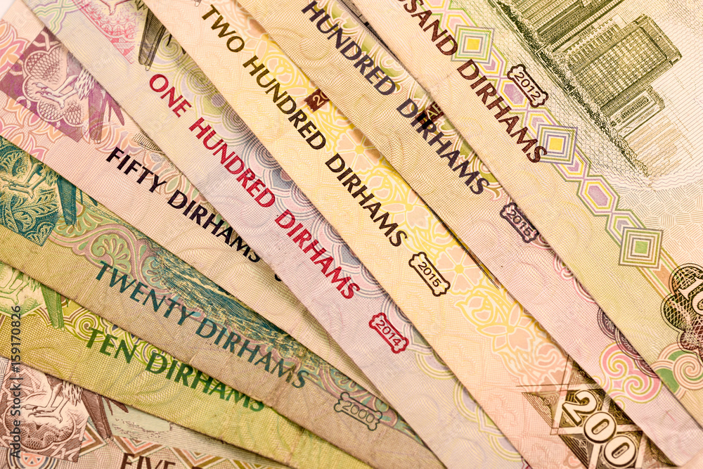 Close up Dirhams currency note and coins, AED, United Arab Emirates Close up Dirhams currency note and coins, AED, United Arab Emirates