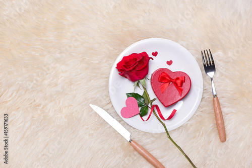 Wedding, Valentines day, Birthday or Celebration background with Red gift box and rose.