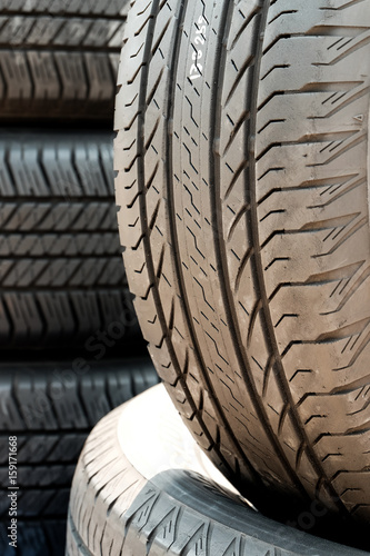 Close up of tread used car tires.