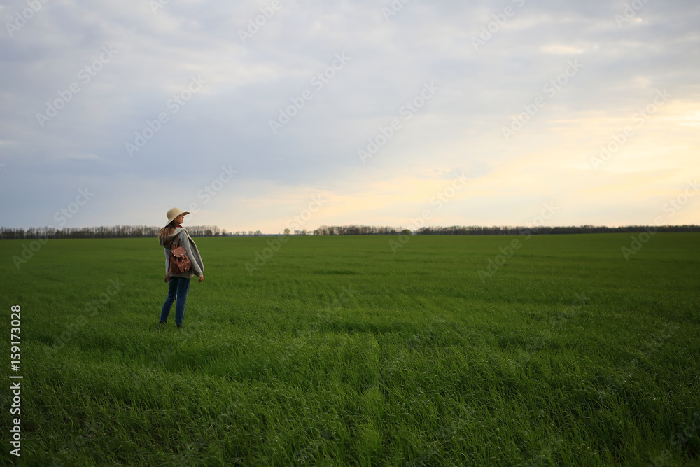 Woman in outdoors field, greens, grass, nature, sunset, sky, inspiration Woman in outdoors field, greens, grass, nature, sunset, sky, inspiration