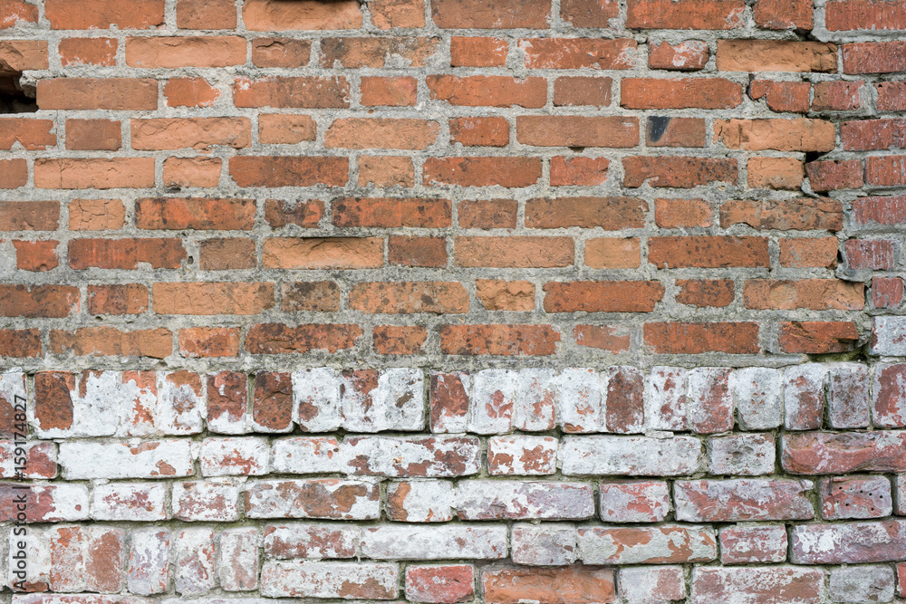 Obraz premium Brick wall, old texture of red stone blocks. Background.