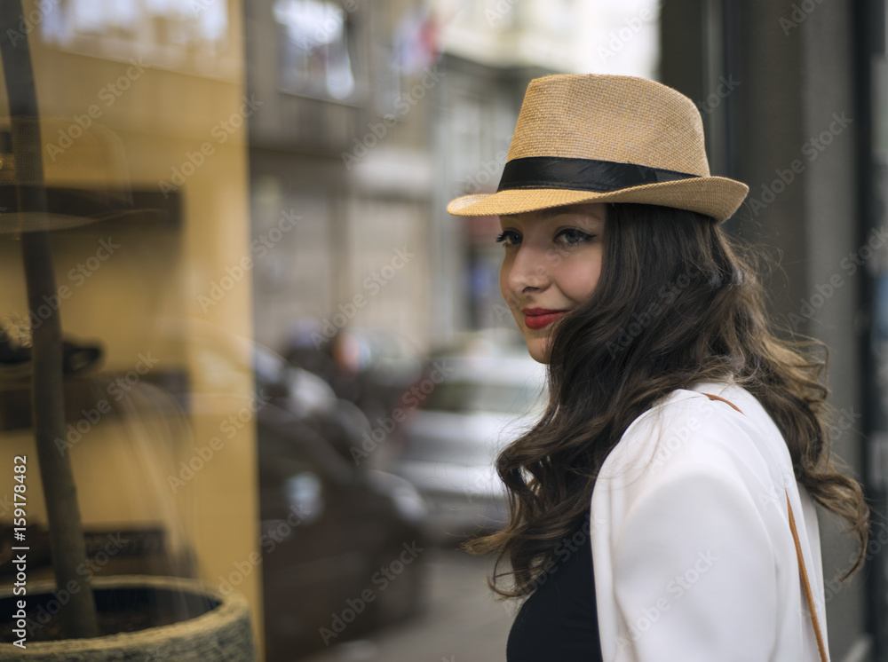 young woman with hat city portret young woman with hat city portret