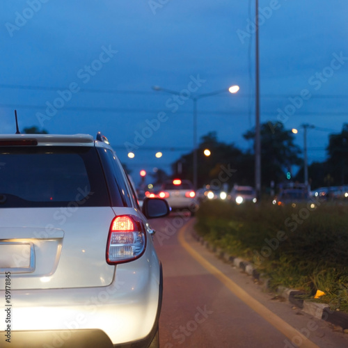 tail light of back car on urban street road