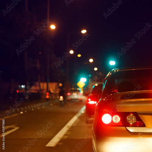 tail light of back car on urban street road