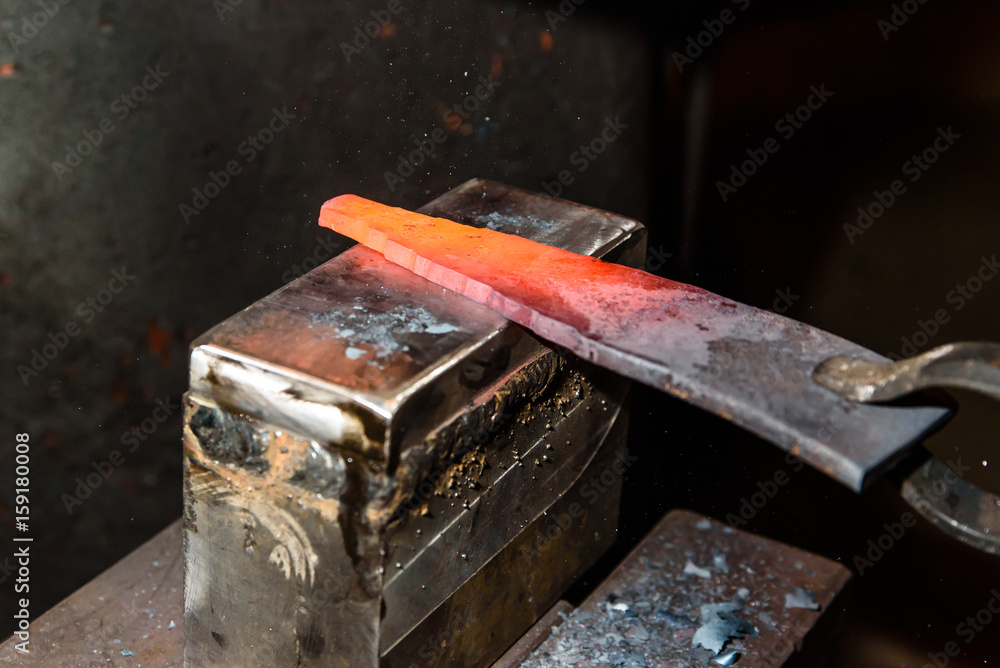 Forging molten metal. Making knives. Forging molten metal. Making knives.