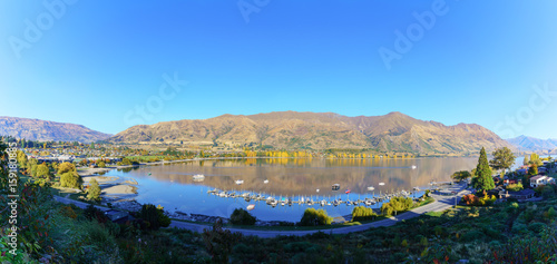 Panoramic image of Lake Wanaka in the morning in Autumn , Wanaka , South Island of New Zealand