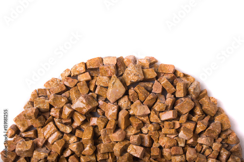 beautiful natural red stone scattered on a white background