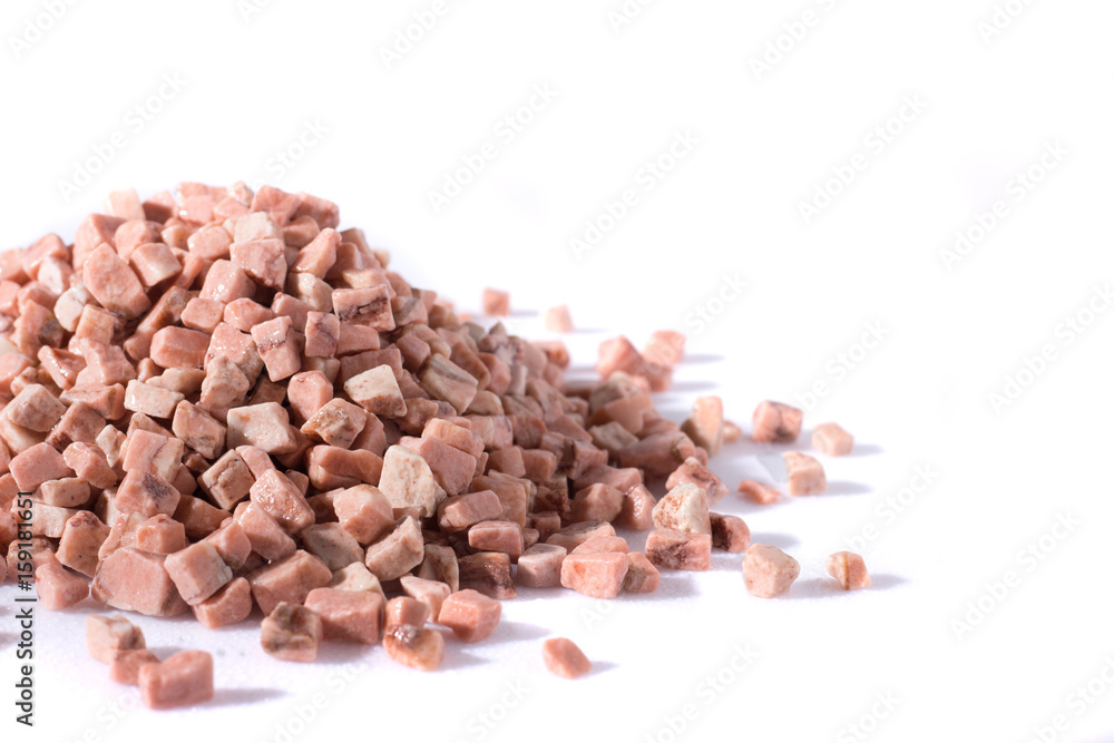 beautiful natural pink stone scattered on a white background beautiful natural pink stone scattered on a white background