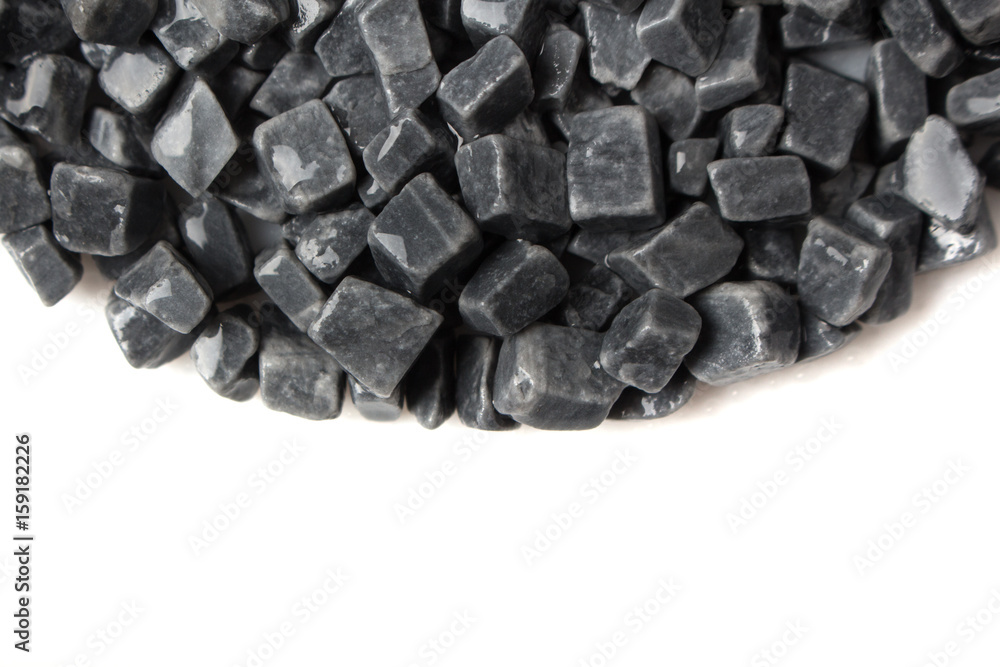 beautiful natural gray stones scattered on a white background beautiful natural gray stones scattered on a white background