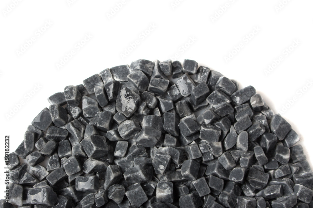beautiful natural gray stones scattered on a white background beautiful natural gray stones scattered on a white background