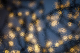 Texture of water drops on the glass. Defocused lights through a wet window