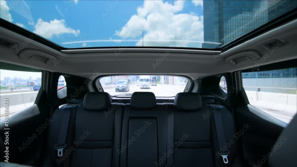 Outdoor glass roof top car cabin. Driving outdoor under beautiful clear
