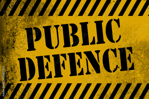 Public defence sign yellow with stripes