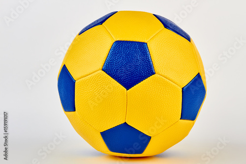 Leather soccer ball closeup image. Colorful soccer ball isolated on white.