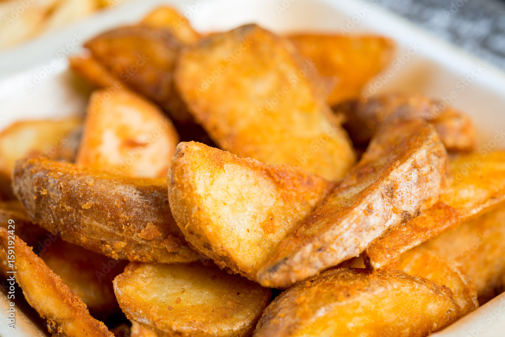 Golden French fries potatoes ready to be eaten Golden French fries potatoes ready to be eaten