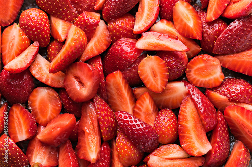 Sliced fresh red ripe strawberry background
