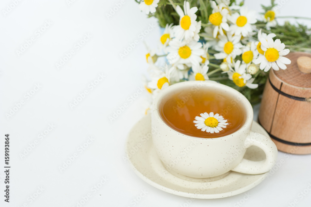 cup of herbal chamomile tea with camomile dry blossoms, dried camomile flowers. doctor treatment and prevention of immune concept, medicine - folk, alternative, complementary, traditional medicine cup of herbal chamomile tea with camomile dry blossoms, dried camomile flowers. doctor treatment and prevention of immune concept, medicine - folk, alternative, complementary, traditional medicine