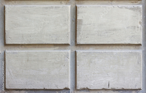 The texture of the concrete walls with rectangular shapes. Closeup