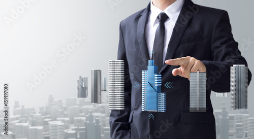 business man select modern building