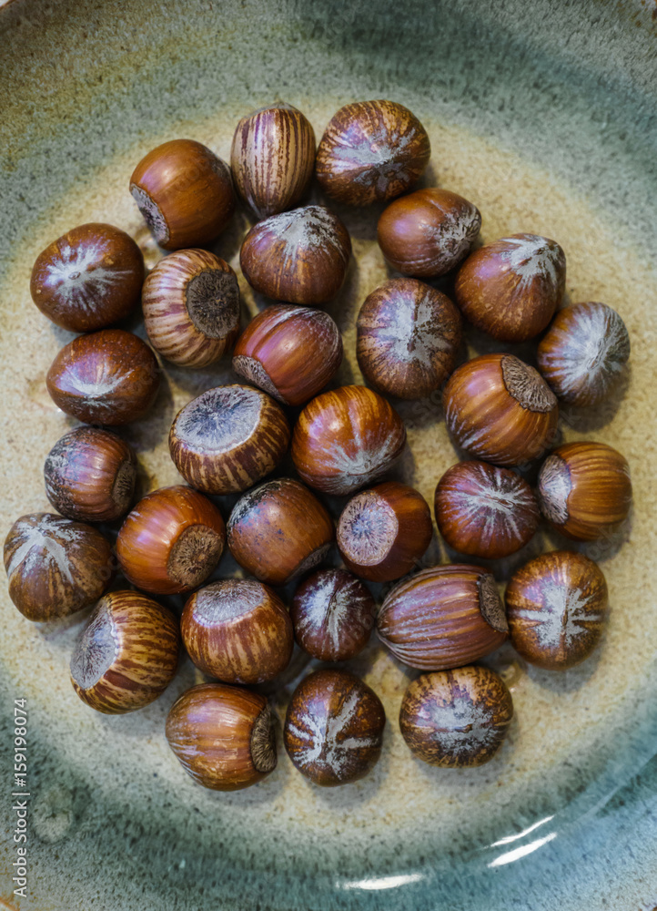 Obraz premium Different nuts scattered on the table.