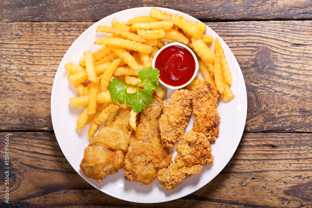plate of fried chicken with french fries plate of fried chicken with french fries