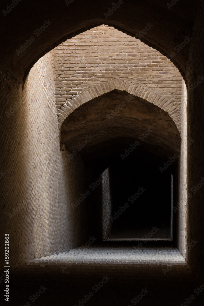 Naklejka premium Islamic style arches in the darkness