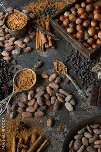 Cocoa and Nut mix on a dark background, Randomly Scattered, Selective focus, Top view