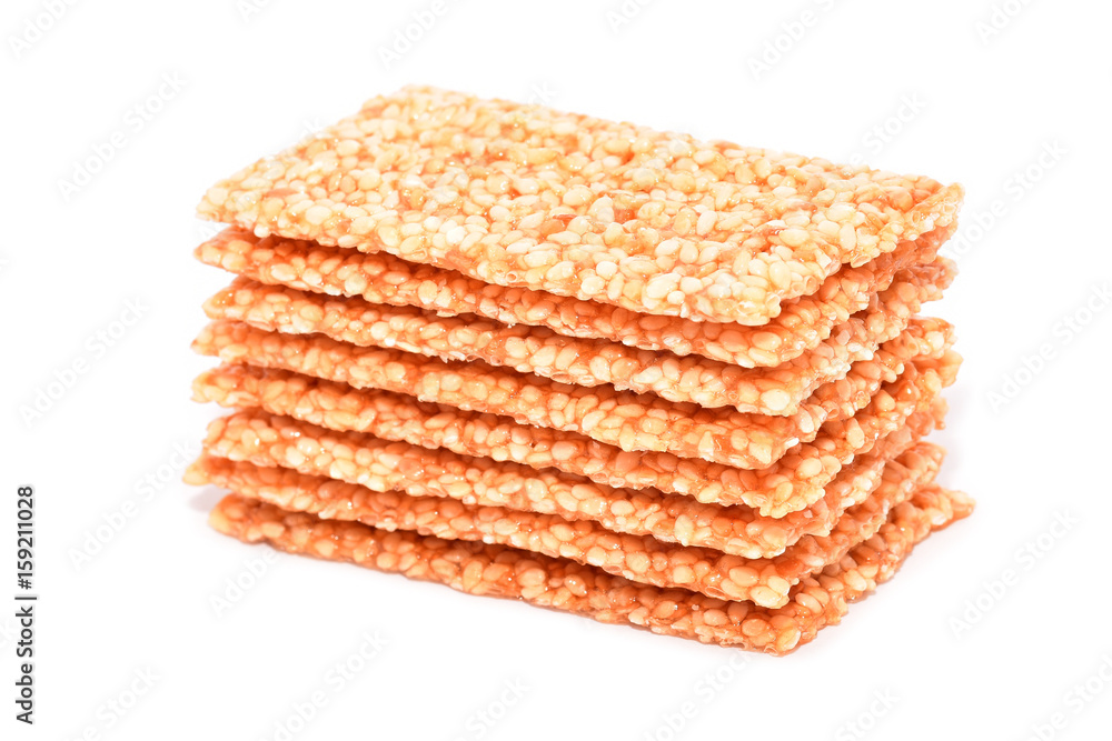Sesame bars with honey isolated on white Sesame bars with honey isolated on white