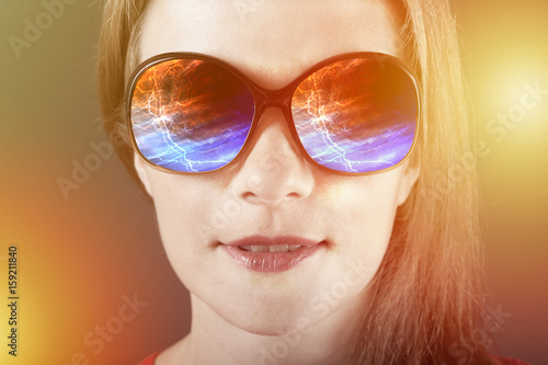 amazed girl in sunglasses with reflection