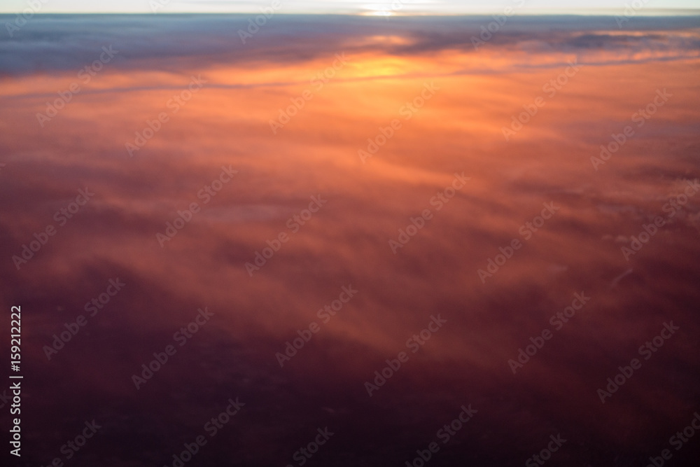 Aerial view of colorful sunrise and clouds