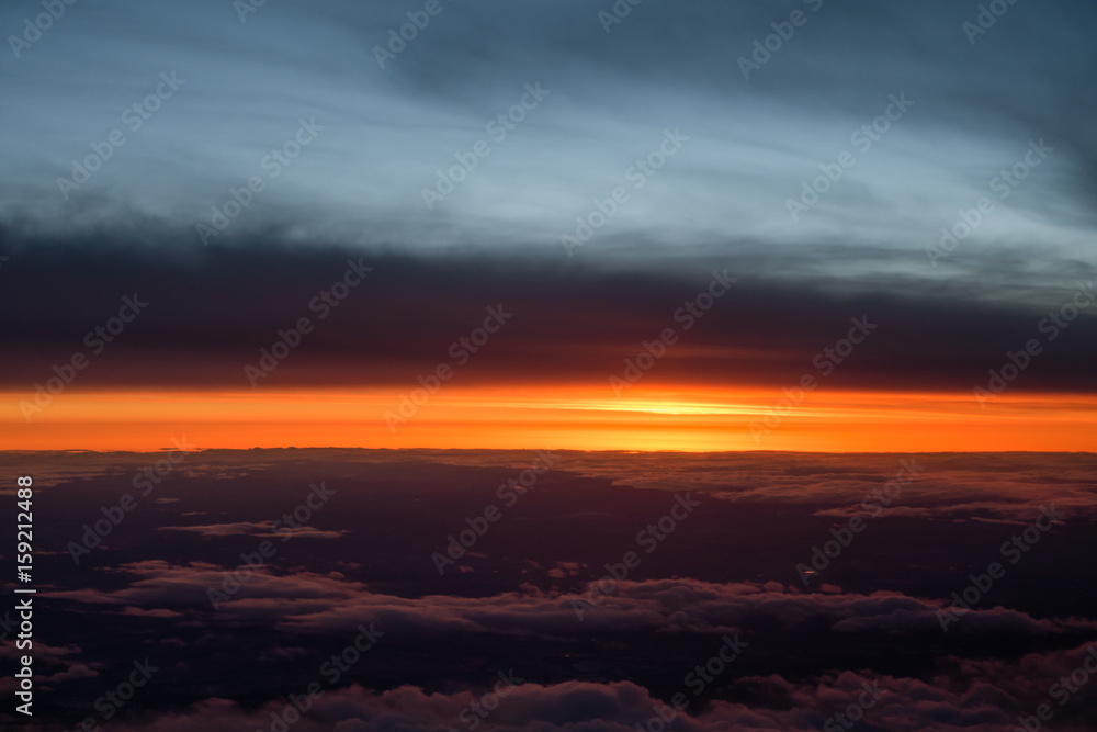 Aerial view of colorful sunrise and clouds