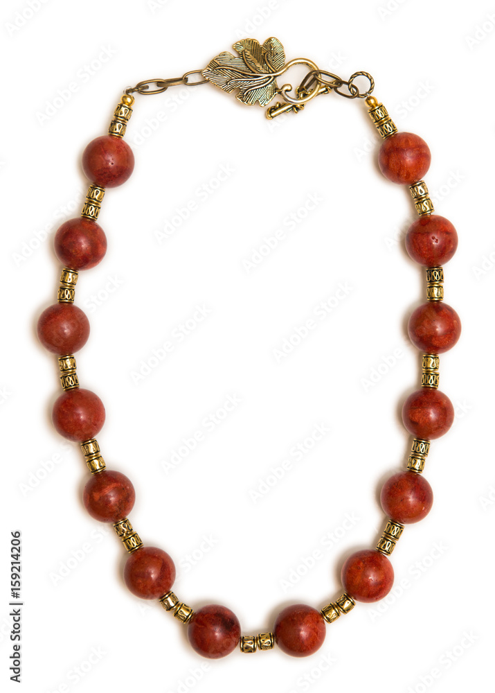 Nice necklace with red beads isolated on white background Nice necklace with red beads isolated on white background