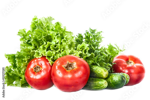 Green vegetables, tomatoes, cucumbers isolated. Antioxidants.