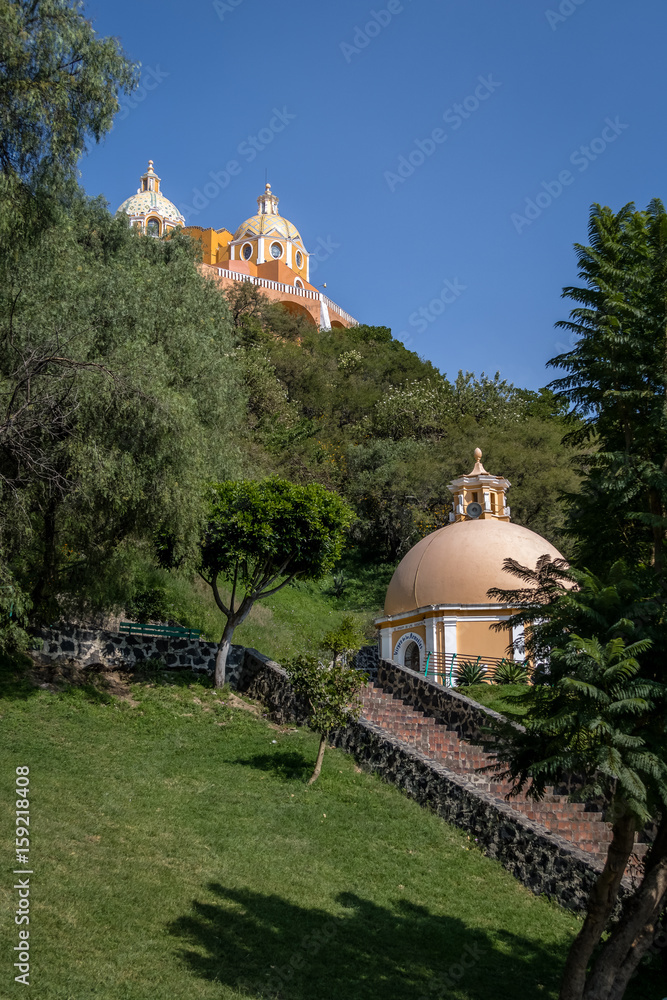 Fototapeta premium Church of Our Lady of Remedies at the top of Cholula pyramid and Well of Wishes - Cholula, Puebla, Mexico