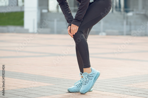 Young woman active exercise workout on street outdoor