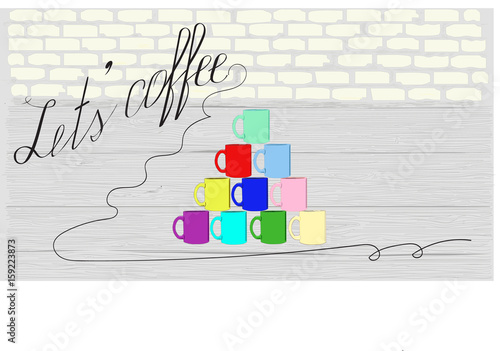 Set of colorful mugs stacked on wooden table wit "Let's coffee" lettering. Copy space.