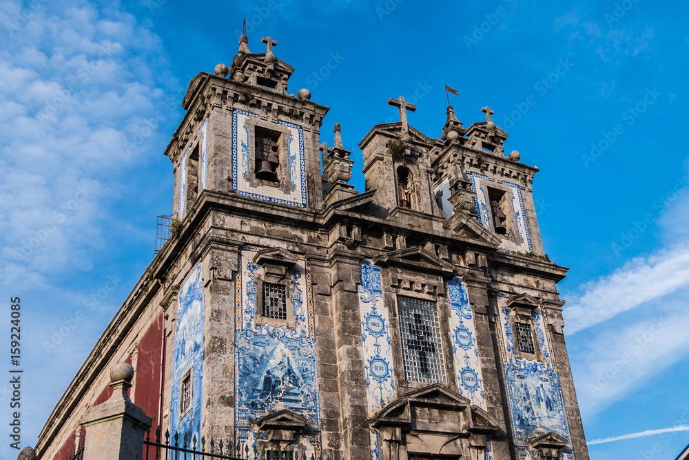 Church of Saint Ildefonso (Igreja de Santo Ildefonso, 1739) near Batalha Square. Porto, Portugal. Facade of azulejo tilework.
