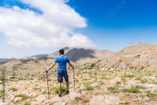 Hiking man in a mountains
