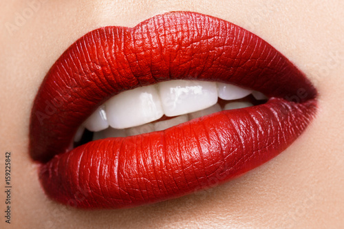 Sexy Lips. Beauty Red Lips Makeup Detail. Beautiful Make-up Closeup. Sensual Open Mouth. lipstick or Lipgloss