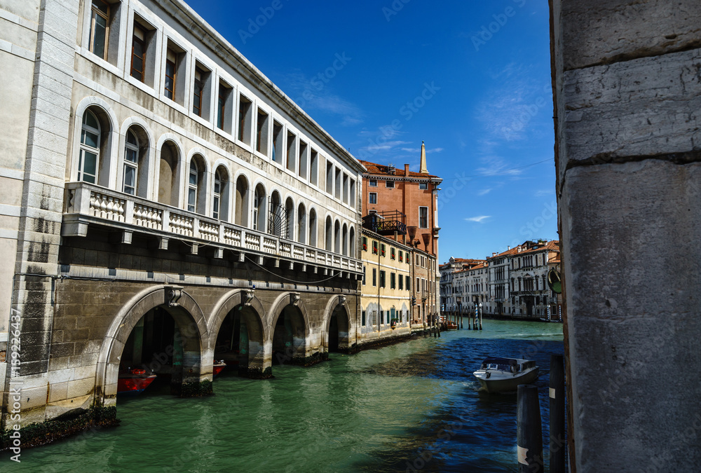 View on famous Grand Canal among historic houses in Venice, Italy at sunny day