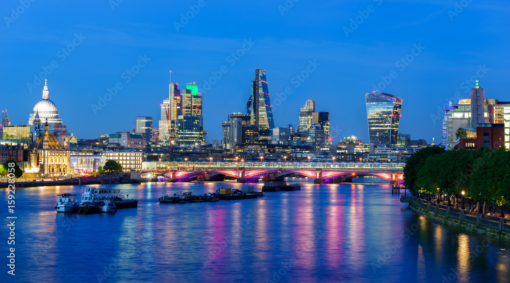 London skyline after duske and skyscrapers at financial district