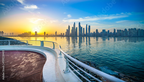 Photography The beauty panorama of skyscrapers in Dubai from promenade at sunrise