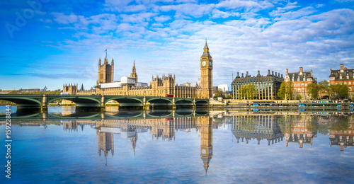 Big Ben and Westminster parliament with blurry refletion in London  United Kingdom at sunny day.