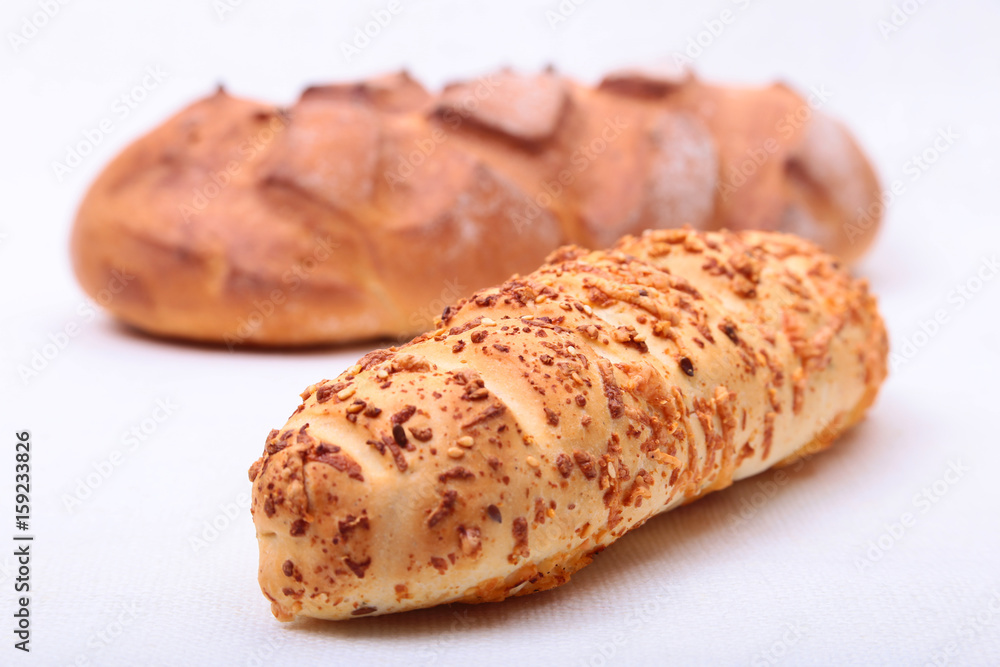 Assorted Fresh homemade bread on white background. Selective focus