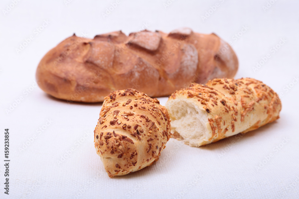 Assorted Fresh homemade bread on white background. Selective focus Assorted Fresh homemade bread on white background. Selective focus