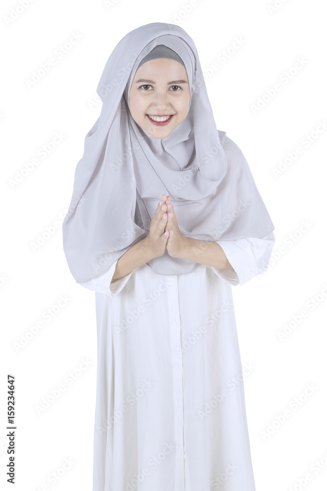 Young woman with welcoming gesture Young woman with welcoming gesture