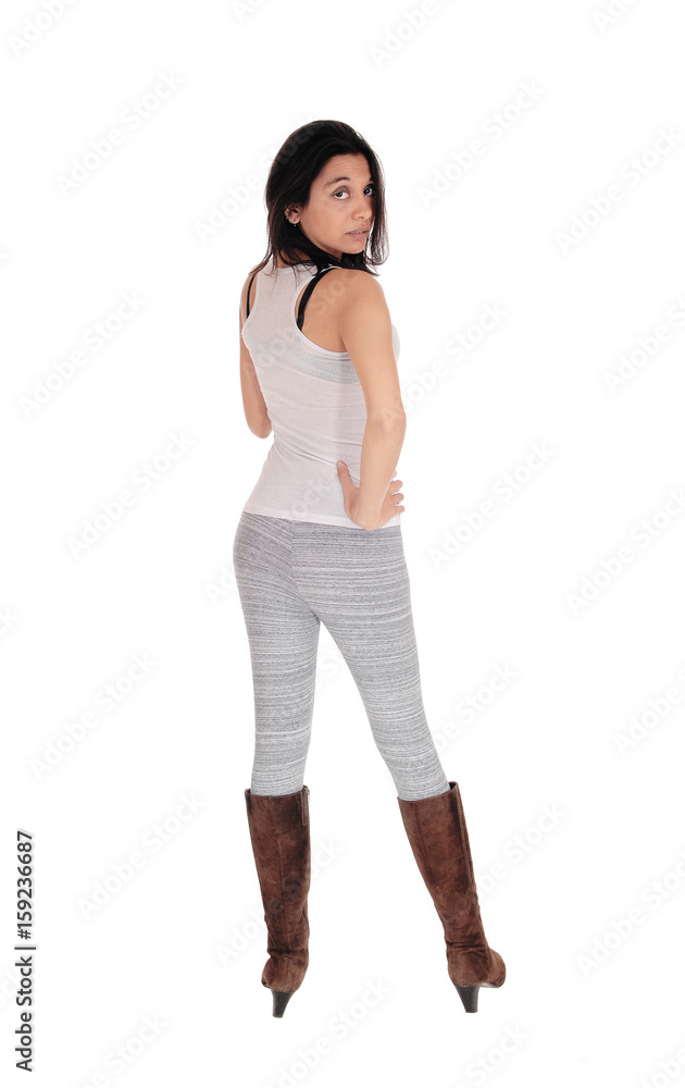 Young woman standing from back. Young woman standing from back.