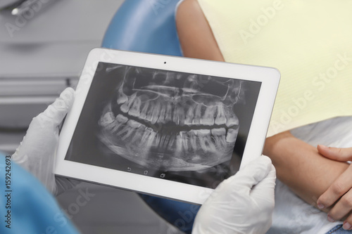 Male hands holding tablet c...