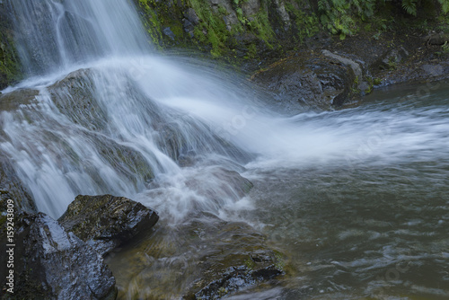 A waterfall on Road 309  Coromandel Peninsula  North Island  New Zealand. One of four images made with different speed to show splashes and streams different way. Soft 3