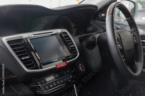Modern car interior (shallow DOF - selective focus  color toned image) © navintar